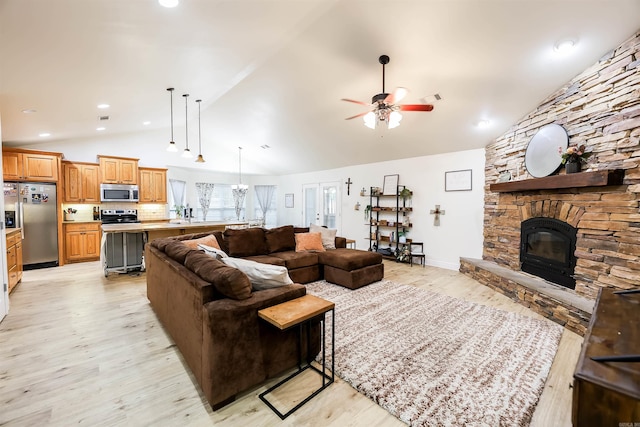 169 Whispering Oak Cir, El Dorado, AR 71730 - living area with light wood-style floors, a fireplace, a ceiling fan, high vaulted ceiling, and recessed lighting