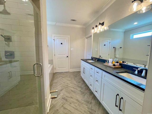 bathroom with parquet floors, vanity, an enclosed shower, and ornamental molding