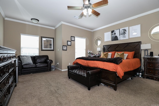 bedroom with carpet floors, ceiling fan, and crown molding