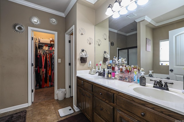 bathroom with ornamental molding, an enclosed shower, and vanity