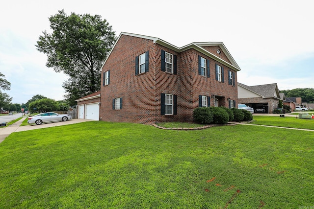 view of side of home featuring a garage and a yard