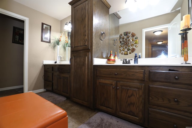 bathroom with vanity and tile patterned floors