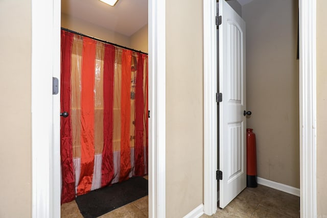 bathroom with tile patterned flooring