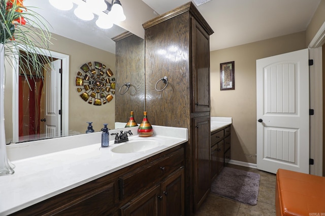 bathroom with vanity and tile patterned flooring