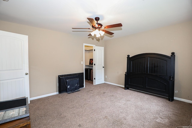 unfurnished bedroom with carpet floors and ceiling fan