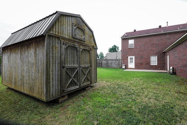 view of outdoor structure with a yard