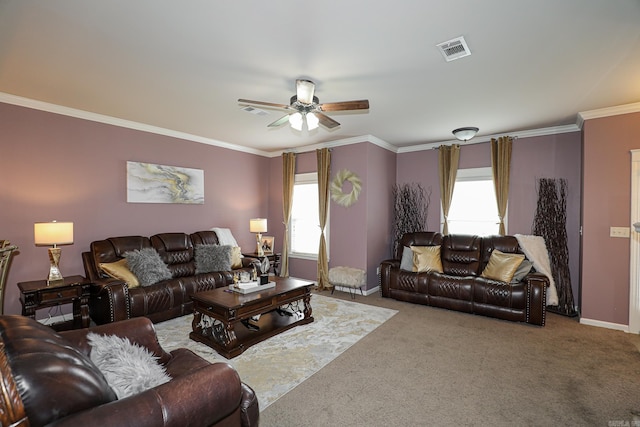 living room with carpet flooring, ornamental molding, a healthy amount of sunlight, and ceiling fan