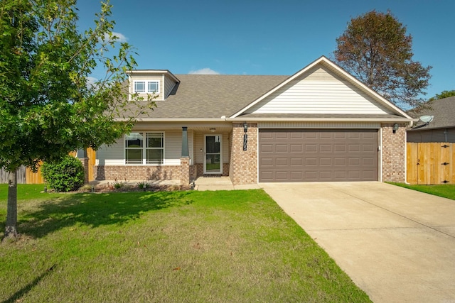 view of front facade with a garage and a front lawn