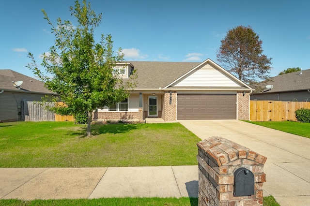 view of front of house featuring a garage and a front yard