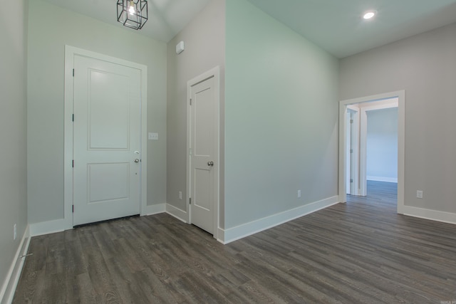 entryway with dark hardwood / wood-style floors