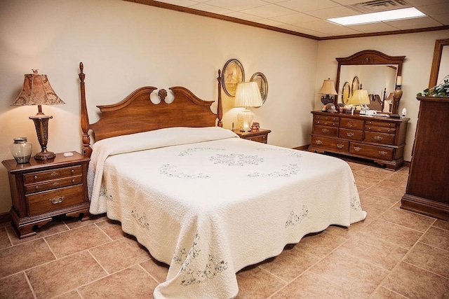 bedroom featuring tile patterned flooring and crown molding