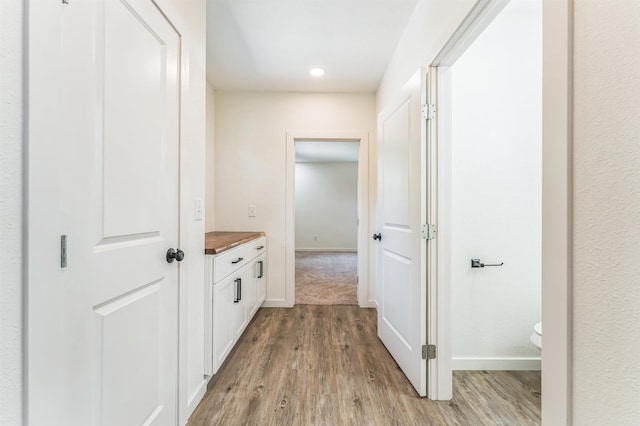 hallway with light wood-type flooring