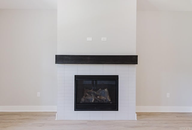 details featuring beamed ceiling and hardwood / wood-style flooring