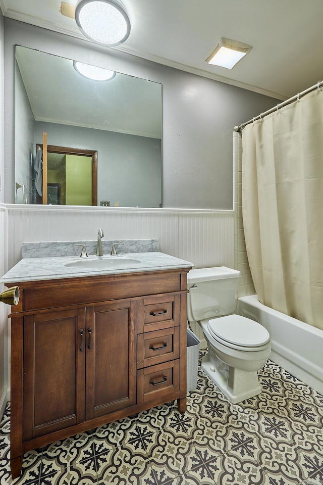 full bathroom with tile patterned flooring, vanity, toilet, and crown molding