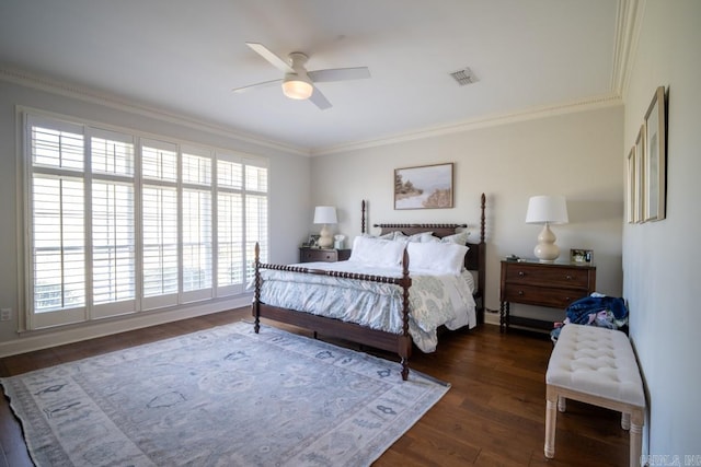 bedroom featuring crown molding, ceiling fan, and dark hardwood / wood-style floors