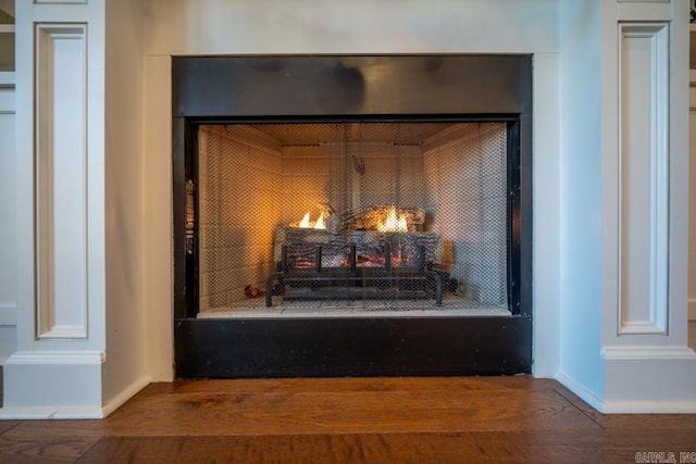 interior details featuring hardwood / wood-style floors