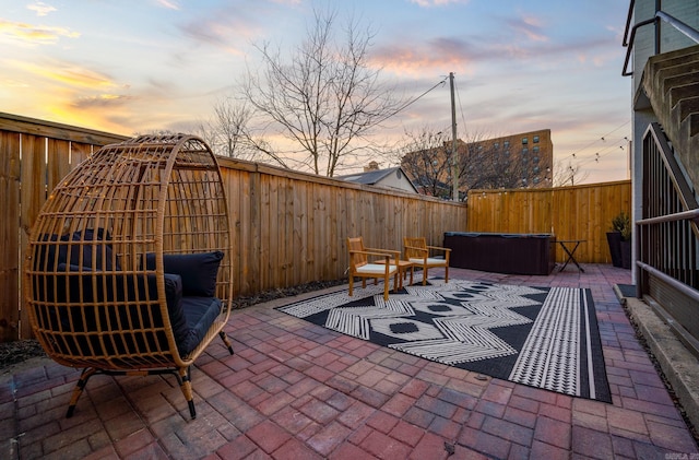 patio terrace at dusk with outdoor lounge area