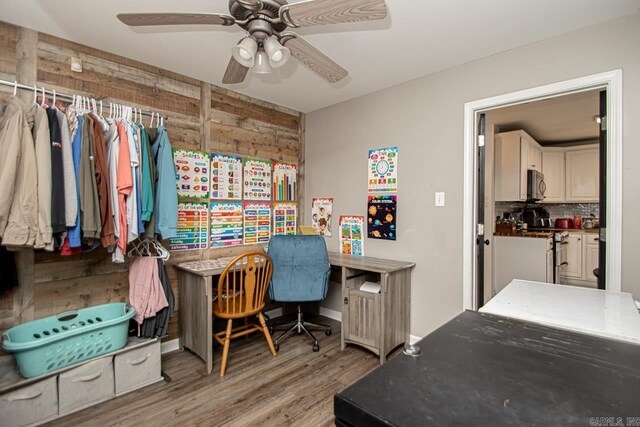 office space with hardwood / wood-style flooring and ceiling fan