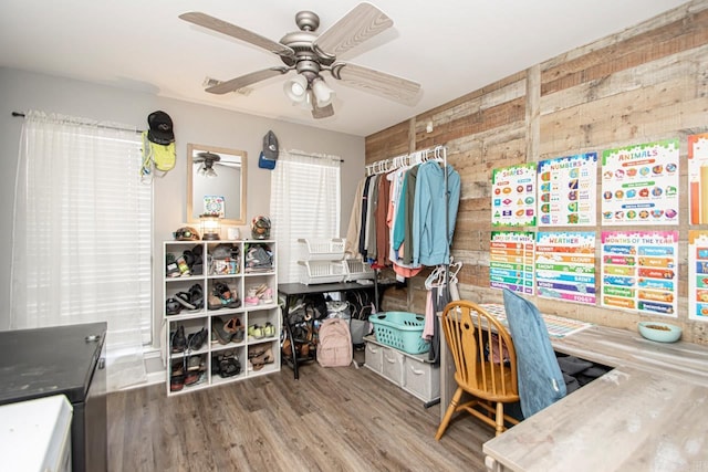 office space with hardwood / wood-style floors and ceiling fan