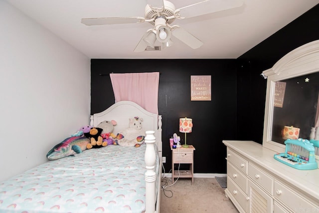 bedroom featuring ceiling fan and light colored carpet