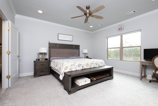 bedroom featuring ornamental molding, light carpet, and ceiling fan