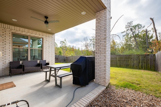 view of patio / terrace with outdoor lounge area, a grill, and ceiling fan