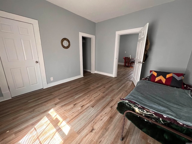 bedroom featuring hardwood / wood-style flooring