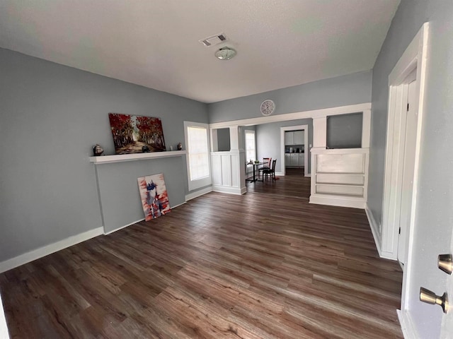 interior space with dark wood-type flooring