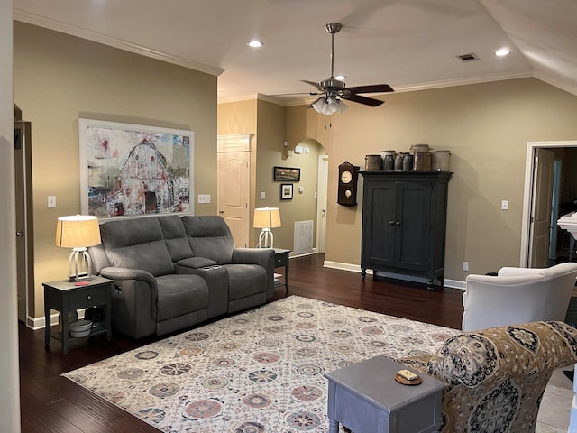 living room with dark wood-type flooring, ceiling fan, lofted ceiling, and ornamental molding