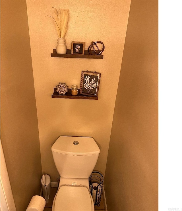 bathroom featuring toilet