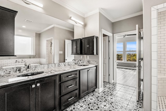 bathroom featuring vanity, hardwood / wood-style floors, and ornamental molding