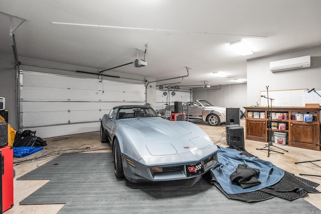 garage with a garage door opener and a wall mounted air conditioner