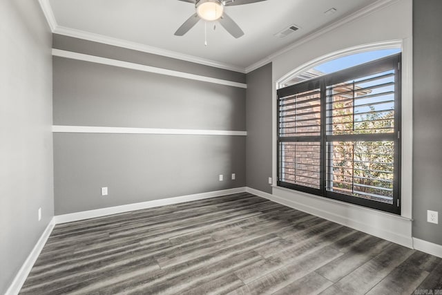 unfurnished room with dark hardwood / wood-style flooring, ceiling fan, and crown molding