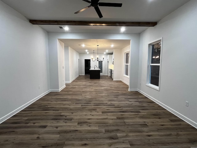2497 Janet, Benton, AR 72015 - unfurnished living room featuring a chandelier, dark wood-style floors, ceiling fan, baseboards, and beam ceiling