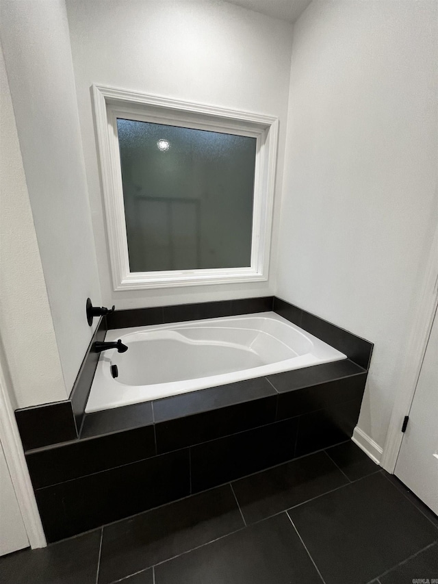 2497 Janet, Benton, AR 72015 - bathroom with a bath and tile patterned flooring