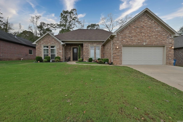 single story home featuring a front lawn and a garage