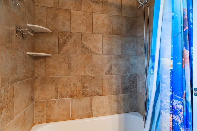 bathroom with shower / bath combo