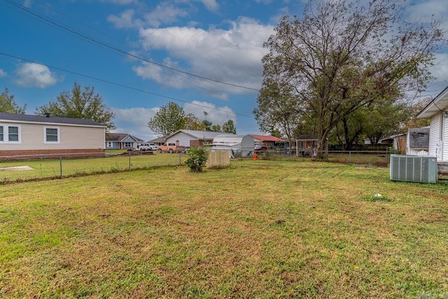 view of yard with central AC