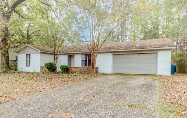 single story home with a garage