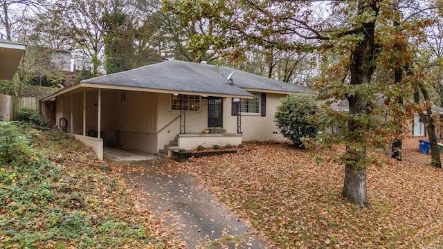 view of front of house featuring a carport