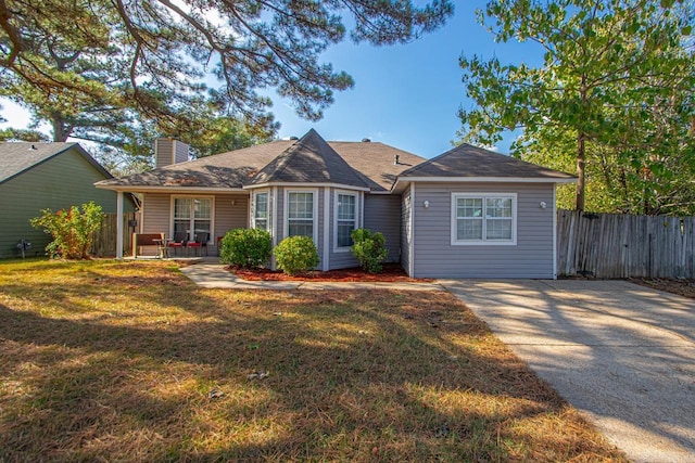 ranch-style house with a front yard