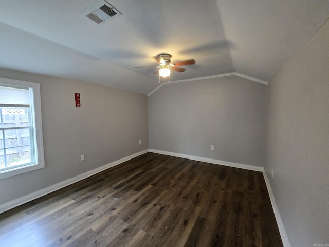 additional living space featuring ceiling fan, lofted ceiling, and dark hardwood / wood-style flooring