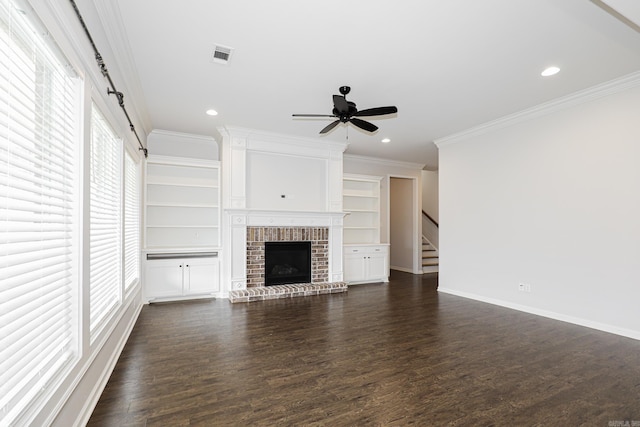 unfurnished living room featuring crown molding and dark hardwood / wood-style flooring