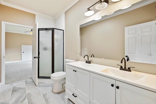 bathroom with toilet, ornamental molding, vanity, ceiling fan, and walk in shower