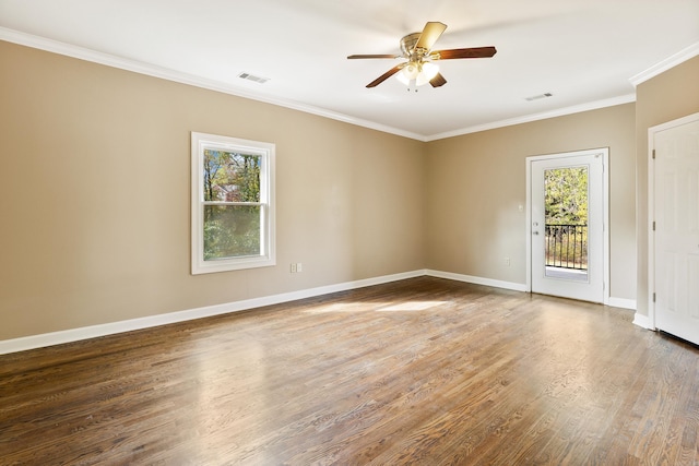 unfurnished room with ornamental molding, wood-type flooring, a healthy amount of sunlight, and ceiling fan