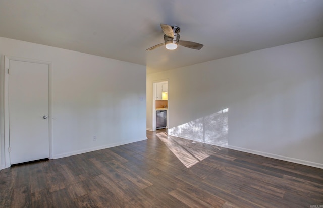 unfurnished room featuring ceiling fan and dark hardwood / wood-style floors