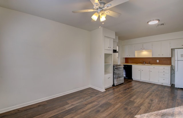 kitchen with ceiling fan, white cabinets, stove, white fridge, and dark hardwood / wood-style flooring