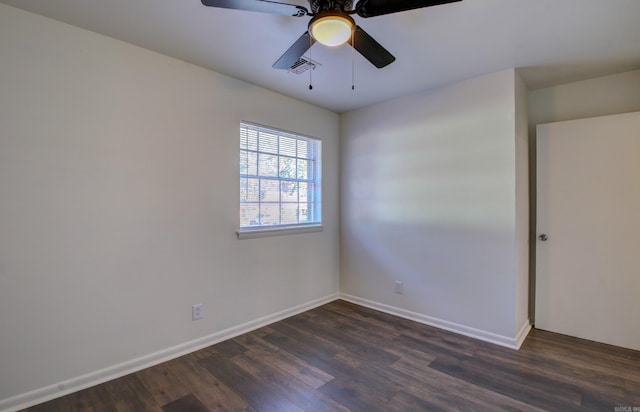 unfurnished room featuring dark hardwood / wood-style floors and ceiling fan