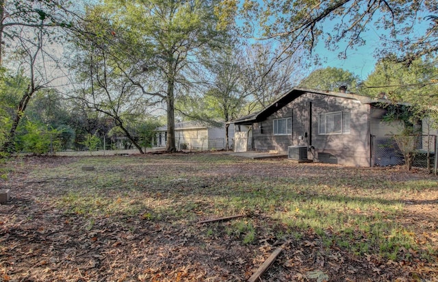 view of yard featuring central AC unit