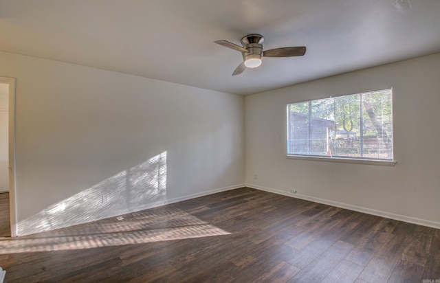 unfurnished room featuring dark hardwood / wood-style flooring and ceiling fan